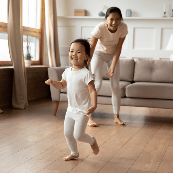 Childminder playing with child