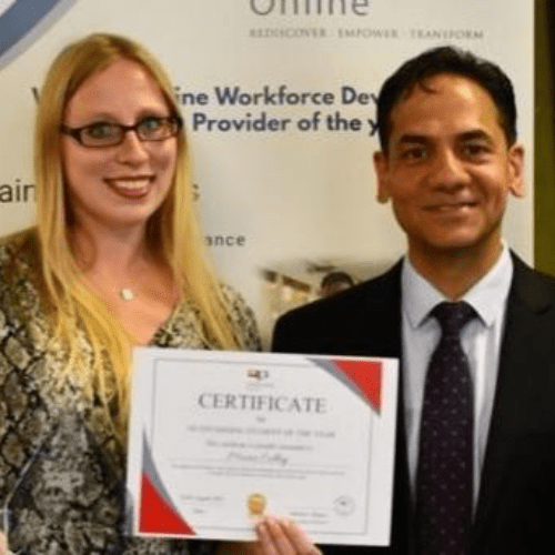 Maria receiving her award
