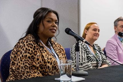 Lady speaking on a panel at the Childcare and Education Expo event 