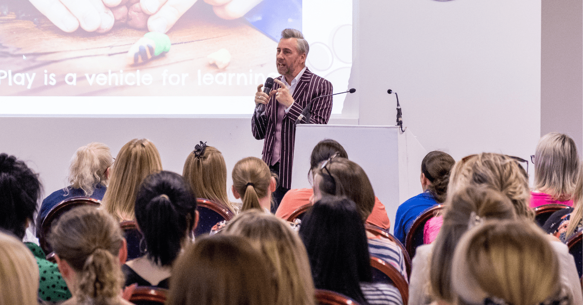 Author Alistair Bryce-Clegg speaking to audience at a Childcare and Education Expo event 