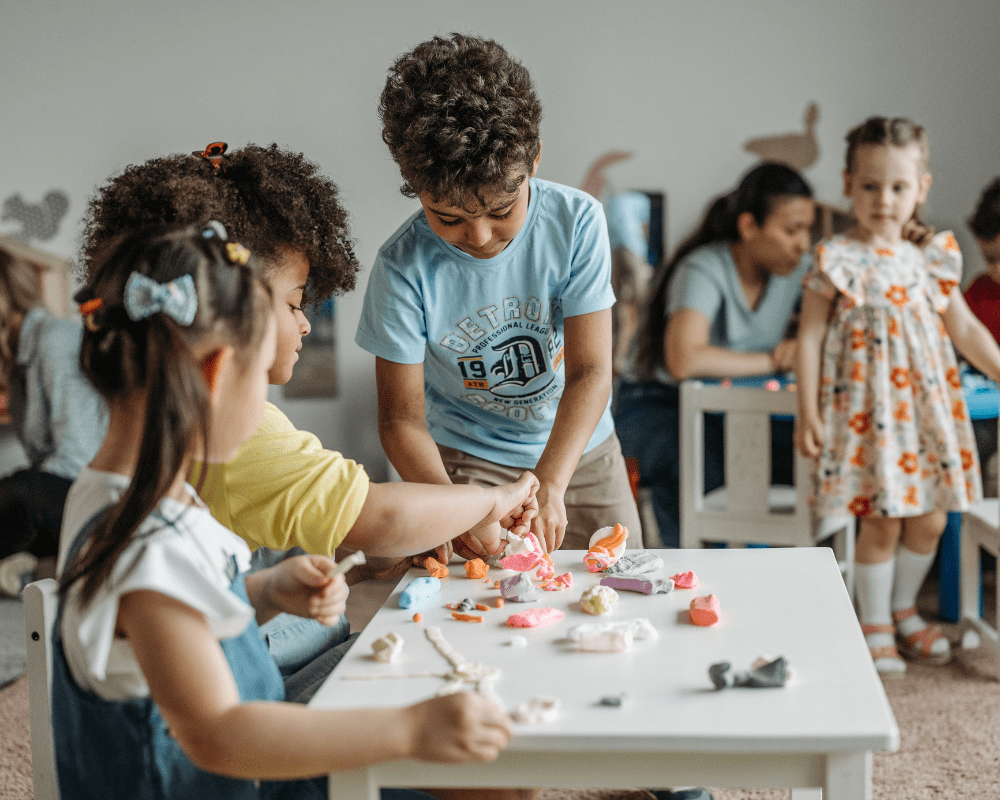 Children playing in room at out of school club