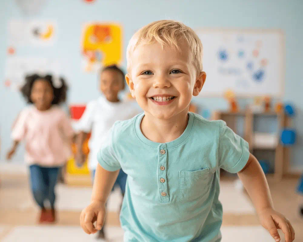 Happy children in preschool classroom