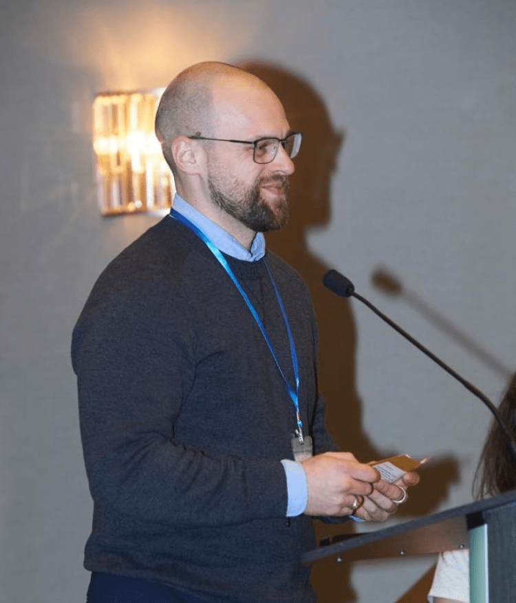 Image of Morton Michel team member speaking at an event