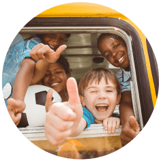 Minibus insurance - happy children in minibus decorative image