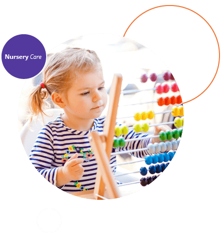 A child using a brightly coloured abacus.