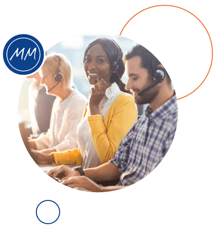 A photograph of people on the telephone in a call centre.