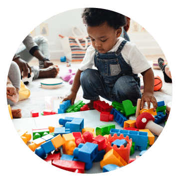 Child playing with building bricks