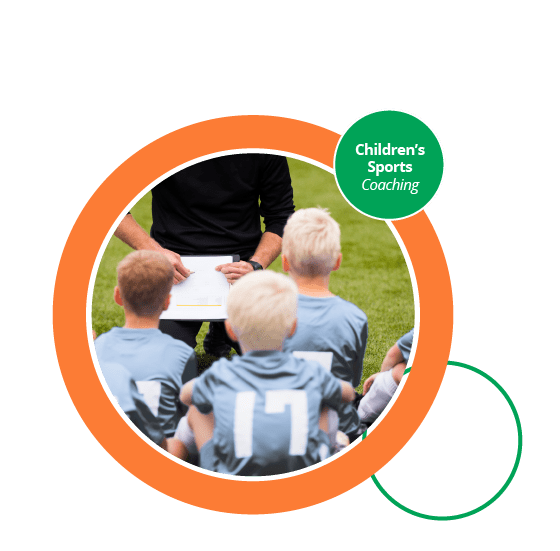 A photograph of children with their coach in a sports setting.