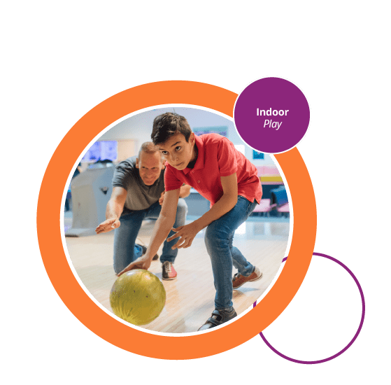 Family playing bowling together