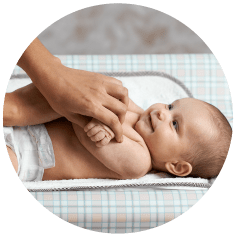 A photograph of a smiling baby.