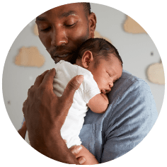 Father with sleeping baby - sleeping consultant